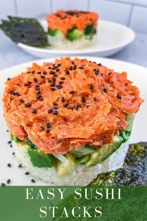 This deconstructed spicy salmon sushi roll is the perfect dish to make when you have a hankering for sushi, but you don’t want to break the bank! These Salmon Stacks are also incredibly easy to make by layering fresh cooked salmon (I also include options for using canned fish), sushi rice, avocado, spicy mayo, cucumbers and some additional optional toppings. Canned Salmon Sushi, Salmon Stack, Seafood Stack, Sushi Stacks Recipe, Salmon Benefits, Sushi Stacks, Spicy Salmon Sushi, Salmon Sushi Rolls, Fish Sushi