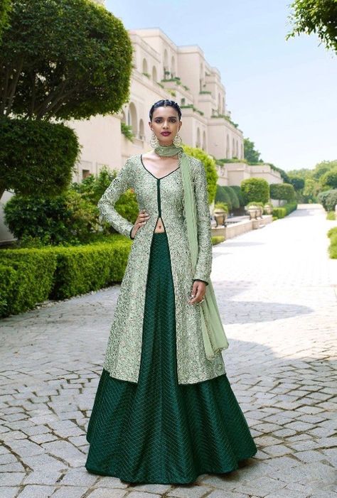 Magnify the wedding pageant by adorning this dress in bottle green and pista color. This dress is designed with pristine all over embroidery and lace work. The dress comes with bhagalpuri top and bhag Bottle Green Combination Outfit Indian, Pista Green Lehenga Combination, Bottle Green Lehenga Combinations, Pista Green Suit Combination, Indian Frocks, Combination Dresses, Pista Green, Mode Abaya, Indian Gowns Dresses