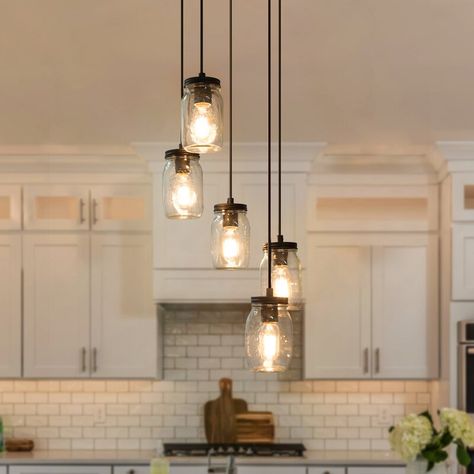 Gracie Oaks Carlile 5 - Light Cluster Jar Pendant | Wayfair Madon Jar Lights, Eclectic Kitchen Island Lighting, Modern Farmhouse Island Lighting, Farmhouse Lighting Fixtures, Farmhouse Style Lighting Fixtures, Trailer House, Farmhouse Style Lighting, Mason Jar Kitchen, Mason Jar Chandelier