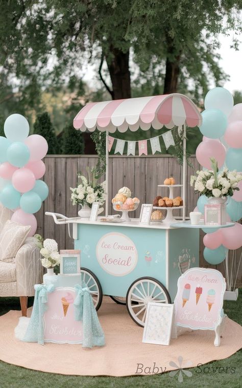 A pastel-colored ice cream cart adorned with decorative balloons, banners, and flowers creates the perfect baby shower idea. Featuring an "Ice Cream Social" sign, alongside cupcakes and jars, it invites guests to indulge while a cozy armchair rests nearby in the charming outdoor garden setting. Baby Sprinkle Ice Cream Party, Baby Shower Sprinkle Theme, Adult Ice Cream Party, Ice Cream Centerpiece Ideas, Candyland Baby Shower Theme, Ice Cream Baby Shower Theme, Ice Cream Baby Shower Ideas, Ice Cream Backdrop, Diy Ice Cream Bar