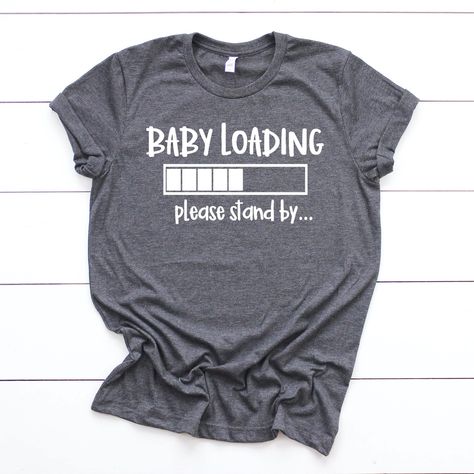 "This pregnancy announcement listing is for one bella canvas unisex pregnancy T-shirt. This shirt is the perfect shirt for your baby announcement or pregnancy reveal. Its also the perfect new mom gift, baby shower gift or maternity gift.  + This shirt is a unisex shirt, not a maternity shirt. Unisex shirts have a \"boyfriend fit\" which works well for pregnant women in their first and second trimesters. Order your normal size for a casual looser fit, size down if you would like a slimmer fit. Al Vinyl Clothes, Baby Loading, Fun Baby Announcement, Baby Announcement Shirts, Baby Birth Announcement, Baby Announcements, Pregnancy Announcement Shirt, Maternity Shirt, Fun Baby