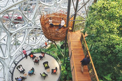 The Amazon Spheres, on the Seattle campus of the online retailer’s headquarters, are three conjoined domes in low-iron glass and painted steel. Designed by NBBJ, they total 70,000 square feet and function as an experimental workplace for Amazon employees (the restaurant, Wilmott’s Ghost, is open to the public). “It’s nature as an experiential conduit for productivity and wellness,” NBBJ interior designer Tara Schneider explains. Amazon Spheres, Seattle Interior Design, Creative Office Space, Louis Kahn, Architectural Photographers, Space Images, Luz Natural, Built Environment, Green Space