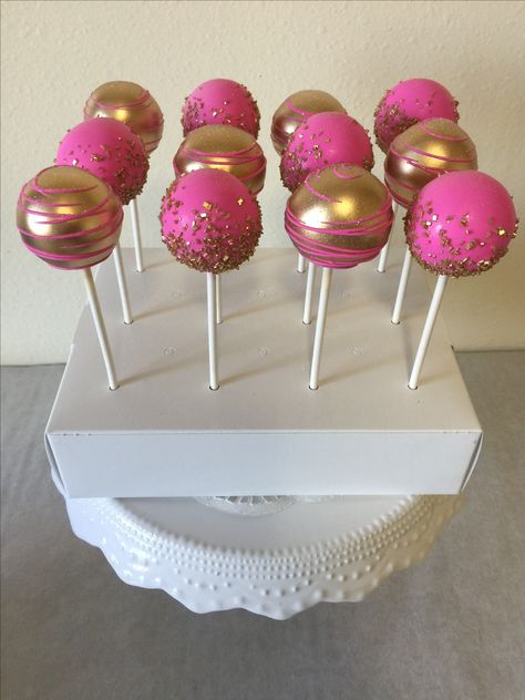 Hot pink and gold cake pops Pink Gold Cake Pops, Barbie Cake Pop Ideas, Hot Pink And Rose Gold Party, Barbie Theme Cake Pops, Hot Pink Bday Cake, Hot Pink Cake Pops, Pink Cake Pops Ideas, Pink Cake Pops Birthday, Hot Pink Birthday Ideas