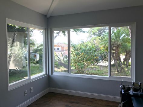 Before and after photos of our window replacement home improvement project. Not a DIY job for us but worth every penny of the cost. We went with vinyl windows instead of wood, and replaced the slider and screen instead of putting in french doors. Read the five biggest lessons we learned. #homeimprovement #diyproject #windows #interiordesign #investment #homedecor #beforeandafter Window Remodel Before And After, Changing Windows Before And After, Window Renovation Before And After, Windows Before And After, Enlarging Windows, Adding Windows To House Before And After, Picture Windows That Open, Enlarge Windows Before And After, Slider Windows Exterior