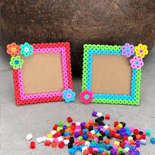 Crafts with a pegboard and fuse beads. Fun crafts for kids! Fuse Bead Wall Art, Things To Do With Beads Diy Projects, Peeler Bead Bookmark, Perler Bead Frame, Perler Bead Picture Frames, Perler Bead Projects, Creative Crafts For Kids, Beads Craft Kids, Perler Beads Ideas