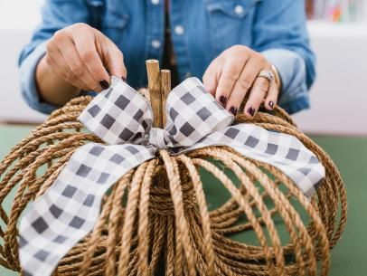 How to Paint Mudcloth-Inspired Pumpkins | Holiday Decorating and Entertaining Ideas & How-Tos | HGTV Grapevine Pumpkin Diy, How To Make Pumpkins, Homemade Fall Decor, Rope Pumpkins, Twine Pumpkins, Pumpkins Diy, Fall Pumpkin Centerpieces, Halloween Decor Diy, Fall Pumpkin Crafts