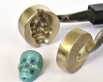 Lampwork tools bead rollers marvers stamps. by LampworkTool Bead Making, 3d Skull, Making Beads, Beaded Skull, Sun Rays, Flower Earrings Studs, Star Flower, Flower Studs, Heart Beads