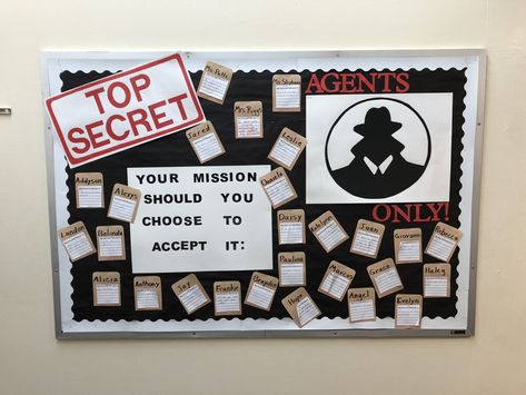 Mission Impossible Bulletin Board with student written goals to begin the school year. Top Secret Bulletin Board, Mission Impossible Bulletin Board Ideas, Mission Possible Bulletin Board, Secret Agent Bulletin Board, Spy Bulletin Board Ideas, Mission Impossible Theme Decorations, Mission Impossible Crafts, Mission Impossible Party Decorations, Mission Impossible Decorations