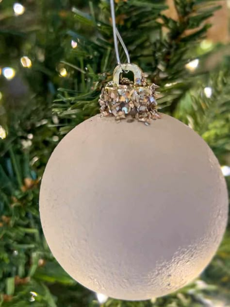 Looking to replace your ornaments for your tree but you're having a hard time finding them? Here are 10 must try DIY Christmas ornaments that you can make today! Refurbished Christmas Balls, Repurposing Christmas Ornaments, Globe Tree Topper, Repurpose Old Ornaments, Upcycle Old Ornaments, Diy Christmas Ornaments Glass Ball, Diy Memorial Christmas Ornaments, Jewelry Ornaments Diy, Diy Victorian Christmas Ornaments