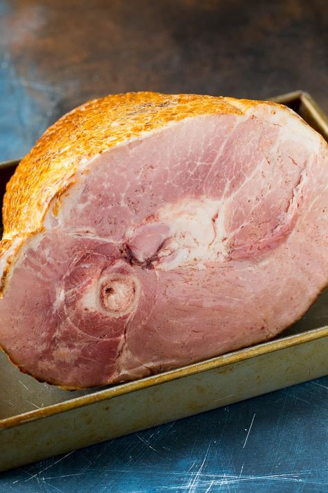 This is a complete guide on how to cook a ham. With detailed information on preparation methods, cooking times, ham glaze ideas and tips and tricks for success, you'll be able to turn out a perfect holiday ham year after year! How To Carve A Ham, How To Cook A Shank Ham In The Oven, Half Ham Recipes Ovens, Ham In Oven Precooked, Shank Ham Recipes Ovens, Precooked Ham In Oven, Cook Ham In Oven, How To Cook A Ham, Cooked Ham Recipes