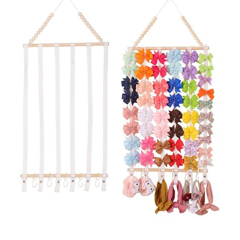 PRICES MAY VARY. Large Capacity(without hair bows):1pc hairbow holder with 6 sturdy and soft cotton belt,2 bigger wooden stick,1 seamless hook and 5 S-shaped hooks.The girls bow organizer a pprox 15〞length and 35〞height.S hook approx 2.3〞length.The girl bow organizer can holder up 100 hair bows or 100 hair clips and 20 headbands.This bow hanger for girls hair bows can accommodate you growing bow and hair accessories collection. High Quality Material:The hair bow organizer has added a new design Girl Bow Organizer, Baby Headband Holder, Hair Bow Storage, Hair Bow Display, Headband Storage, Bow Storage, Bow Display, Hair Bow Organizer, Headband Organizer