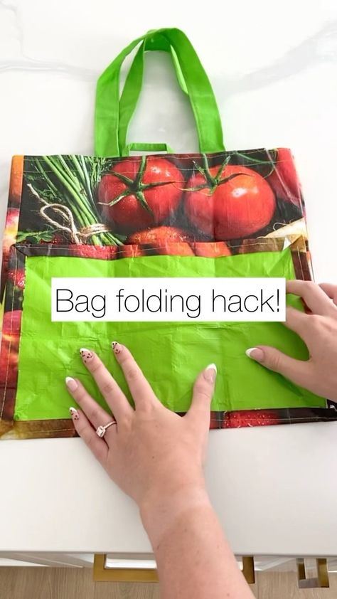 We are totally obsessed with this shopping bag folding hack!✨ Who here has wayyy to many of these?🙋🏻‍♀️ #everythingenvy #folding… | Instagram Folded Shopping Bag Pattern, Shopping Bags Storage, Organizing Reusable Grocery Bags, Shopping Bags Organization, Fold Grocery Bags, Fold Reusable Grocery Bags, Folding Reusable Bags, Folding Reusable Grocery Bags, How To Fold Reusable Bags Shopping