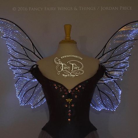 Last but definitely not least to be listed tomorrow morning, Oct. 1 at 6am PST for $575, are the light up Clarion fairy wings with cool white lights, clear iridescent Diamond Fire film and black veins. Will come with a removable decorated pouch to hold the battery pack, though in the photo it is tucked right into the back of the corset. Light tech by @the.eye.of.oberon #fairywings #lightupwings #lightup #faerie #LED #faeriewings Black Fairy Wings, Light Up Wings, Fae Costume, Blue Fairy Wings, Diy Fairy Wings, Fairy Wings Costume, Black Veins, Iridescent Light, Diy Wings