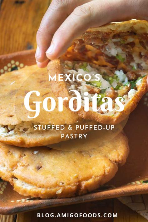 Gorditas can be experimented with quite a bit. For instance, instead of slicing open the fried gordita, you may stuff the gordita with your favorite fillings at the dough stage, seal it much like empanadas. The best thing about cooking is that you can have or develop your own style. #mexicanfood #mexico #amigofoods #gorditas Cooks Country Gorditas, Homemade Gorditas Recipes, Corn Gorditas Recipe Mexican, Gorditas Recipe Mexican Filling, Gorditas Recipe Mexican Maseca, Gorditas Recipe Mexican Easy, Authentic Mexican Gorditas Recipe, Fried Gorditas Recipe Mexican, How To Make Gorditas With Maseca