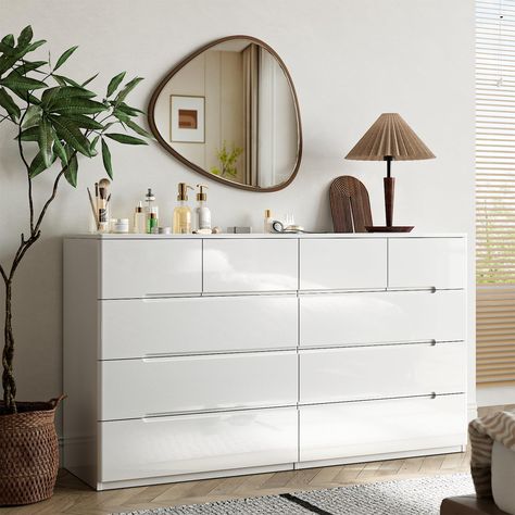 PRICES MAY VARY. 【High Gloss Modern Dresser】ZORPLIX white dresser is minimalism at its most classic. The high gloss finish adds a touch of modernity and instantly enhances the ambiance of your space. Its sleek design features grooved handles on spacious drawers, adding a unique accent with safety. Our dresser exuding modernity while maintaining a neat aesthetic. 【Large 10 Drawer Dresser】Our dresser for bedroom boasts 6 large drawers and 4 medium drawers (13.8"depth), provides versatile and ample Unique Dressers Bedroom, Cozy Bedroom Dresser, Dresser For Bedroom, Modern Dressers For Bedroom, Large Dresser Bedroom, Chest Drawers, Dresser Ideas Bedroom, Aesthetic Dresser, Bedroom Dresser Ideas