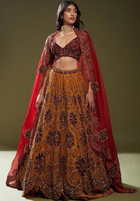 Outfit Details: Bridal Lehenga Choli. Color: Mustard & Maroon. Fabric: 9000 Velvet. Work: Multi Needle Work, Coding Work, Embroidery Work, Zari Work, Full Stone Work. Inclusions: Lehenga, Deep V-neck embroidered blouse & Border Embroidered Dupatta. Customizable. Made to order. Mustard Yellow Lehenga, Maroon Lehenga Choli, Indian Outfit Ideas, Maroon Lehenga, Maroon Fabric, Yellow Lehenga, Bridal Lehenga Red, Lehenga Collection, Bridal Lehenga Choli