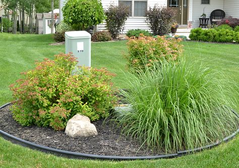 Plantings help disguise the utility boxes at a new build on Grand Island, NY. Side Landscaping, Utility Covers, Lawn Ideas, Front Lawn Landscaping, Well Cover, Front Walk, Landscaping Inspiration, Fall Garden Vegetables, Recycled Garden