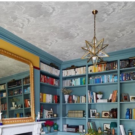 Laura Stephens on Instagram: "More than ever so many rooms are multi-purpose and this one is a playroom and reception room with wrap around joinery to create a library…. The cloud ceiling and use of paint prevents it from feeling too grown up! 📷 @snookphotograph #playroom #library #study #joinery #bookshelves #farrowandball #ovalroomblue #ovalroombluefarrowandball #sudburyyellow #sudburyyellowfarrowandball" Grown Up Playroom, Study Joinery, Playroom Library, Cloud Ceiling, Oval Room Blue, Library Study, Reception Room, The Cloud, Reception Rooms