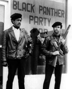 Black Panther Party | History, Ideology, & Facts | Britannica.com Primary source photograph of founder Huey Newton armed in classic BPP attire and a rifle. One of their main practices was to protect and arm themselves. The police in Oak and in the country were/are very corrupt. They saw this as reason to bear arms. Huey Newton, Black Panthers Movement, Bobby Seale, Art Expressions, Moda Hippie, Historia Universal, Black Panther Party, Black Panthers, By Any Means Necessary