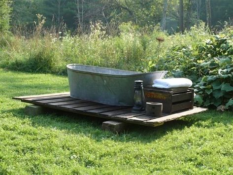 I can only dream of how much fun it would be to jump in a tub in the middle of my garden!!!!  My husband would stroke out over it. Weather Projects, Outdoor Bathtub, Galvanized Tub, Metal Tub, Japanese Soaking Tubs, Outdoor Tub, Outdoor Baths, Small Swimming Pools, Eclectic Bathroom