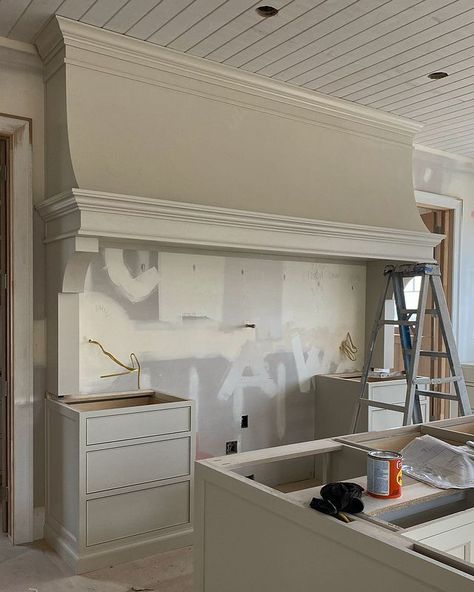 Alex Adamson on Instagram: “A few recent progress shots of this home. Cabinetry is finishing up and painting is starting! #alpinecirclehome” Range Wall No Uppers, Farm Sink In Island Kitchen, Stand Alone Range Hood, Sophisticated Kitchen Design, Stove Hoods Farmhouse, Range Hood Ideas, Kitchen Mantle, Kitchen Hood Design, Kitchen Hood