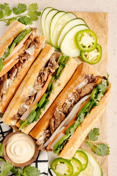 Easy Pork Bánh Mì Recipe Pork Banh Mi, Banh Mi Recipe, Remoulade Sauce, Asian Street Food, Sandwich Ingredients, Protein Nutrition, Marinated Pork, Pickled Vegetables, Easy Pork