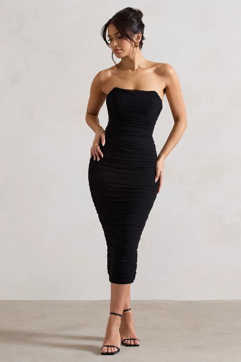 Turn your attention toNylah, our latest lavish midi dress. Crafted in a classic black shade of our signature stretch jersey, this fully ruched piece is transcended by a soft mesh overlay and sculpting bodycon silhouette. Defined by a boned corset bodice and lace up back to enhance all your feminine features, try styling this strapless midi withSadieto add a touch of sparkle.  Features  - Premium stretch jersey - Mesh overlay - Fully ruched - Bodycon fit  - Curved bandeau neckline  - Boned corset bodice - Lace up back - Split hemline  - Midi length   Sizing & Fit  Model is 5'8 and wears UK size 8 / US size 4  Product Information     Double layered with good stretch  Premium jersey & mesh in Black (92% Polyester, 8% Elastane)  120cm total length  SKU:CL133268002 Black Ruched Midi Dress, Feminine Features, Ruffle Bodycon Dress, Velvet Prom Dress, Ruffle Bodycon, Black Dress Prom, Corset Bodice, Party Dress Long Sleeve, Ruched Midi Dress