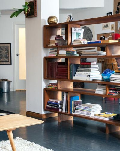 Have a large, open space that needs some privacy? This loft, originally seen on Remodelista, shows how a large bookcase is the perfect piece for the job. Room Divider Ideas Diy, Room Divider Diy, Bookshelf Room Divider, Mid Century Modern Bookcase, Modern Room Divider, Diy Room Divider, Modern Bookcase, Room Partition, Mid Century Modern Furniture