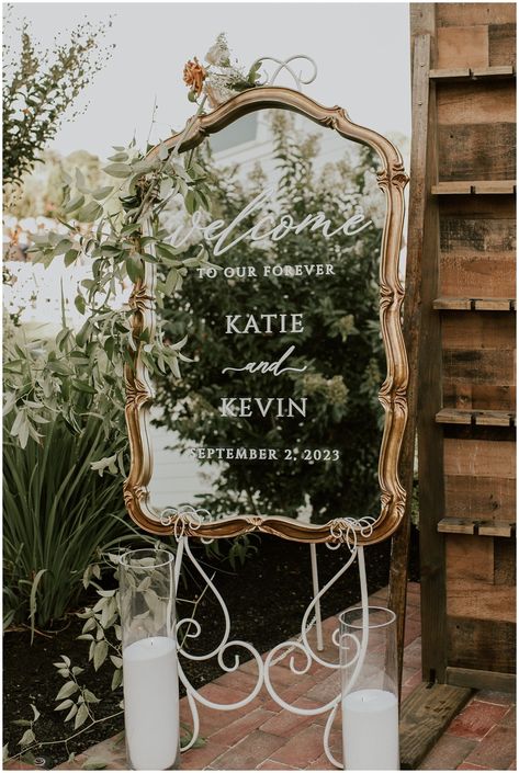 Looking for that perfect wedding welcome sign to match the old-world charm of your reception? Consider a vintage gold mirror for your welcome sign, complete with hand-written calligraphy welcoming your guests as they arrive! #weddingwelcomesignideas #newjerseywedding #newjerseyphotographer #Weddingphotography Vintage Mirror For Wedding, Wedding Welcome Sign Vintage Mirror, Gold Mirror Sign Wedding, Welcome Sign Wedding Unique, Oval Mirror Wedding Sign, Wedding Welcome Sign Mirror Vintage, What To Throw At A Wedding, Wedding Entry Sign Mirror, Wedding Signs For Reception Mirror