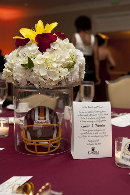 You can subtly incorporate your team's colors into your flowers #football #wedding Football Themed Wedding Reception, Fundraiser Decorations, Football Banquet Centerpieces, Football Wedding Theme, Football Centerpieces, Sports Centerpieces, Football Event, Banquet Centerpieces, Sports Themed Wedding