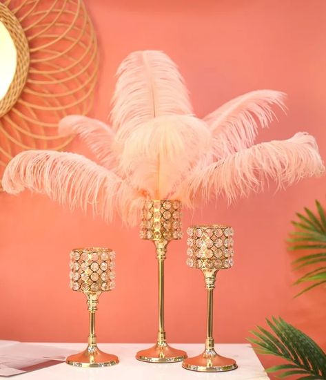 This Gold Candle Holder with Feathers Set is perfect for your glamorous table setting. You can also use it for your shelves and center table to have a more luxurious look. You can always remove the… Candles With Feathers, Square Candle Holders, Cat Candle Holder, Black Candelabra, Baddie Room, Shell Candle Holder, Gold Candle Holder, Crystals Pink, Skull Candle Holder