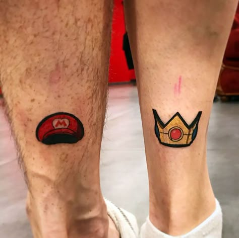 Couples Mario Tattoos, Anime Couple Tattoos Ideas, Mario And Peach Tattoo, Mario Peach Tattoo, Minimalist Mario Tattoo, Mario Inspired Tattoos, Mario Couple Tattoos, Matching Tattoos Gaming, Matching Tattoos Couples Gaming