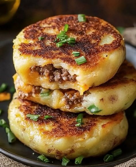 Quick & Easy Stuffed Potato Cakes | Stuffed Potato Cakes Recipe, Stuffed Potato Patties, Stuffed Mashed Potatoes Recipes, Layered Fried Potatoes, Beef Stuffed Potato Cakes, Cheese Filled Potato Cakes, Crispy Mashed Potato Cakes, Fried Leftover Mashed Potatoes, Fried Potatoes With Cheese