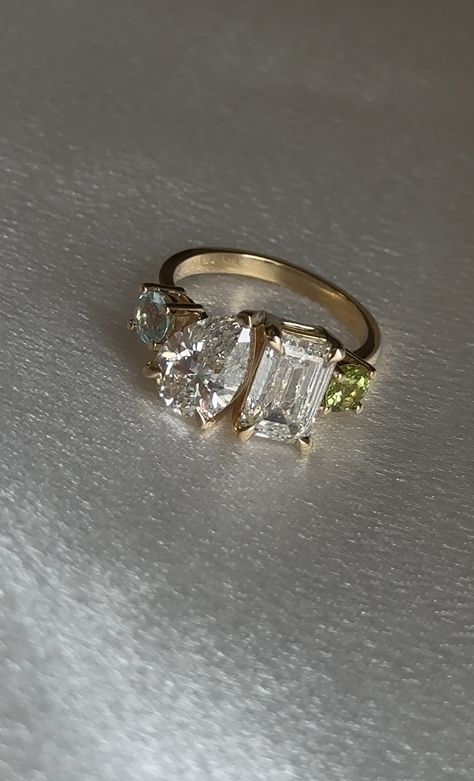 Stunning ring with pear and emerald cut diamonds, and two birthstones topaz and amethyst Two Stone Engagement Ring Emerald, Two Stone Engagement Ring, Engagement Ring Emerald, Topaz Engagement Ring, Ring Emerald, Stone Engagement Ring, Stone Engagement Rings, Stone Engagement, Emerald Engagement Ring