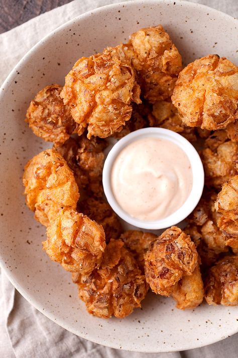 Bite-Sized Blooming Onions Recipes Buttermilk, Blooming Onions, Onion Appetizers, Honey Popcorn, Creamy Honey, Recipes Savory, Blooming Onion, Popular Appetizers, Honey Sesame