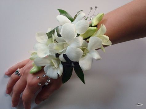 Classy Corsage, White And Green Corsage Prom, Orchid Corsage, Orchid Wrist Corsage, Orchid Corsage And Boutonniere, White Orchid Corsage, Purple Orchid Corsage, Diamond Birthstone Ring, Orchid Corsages