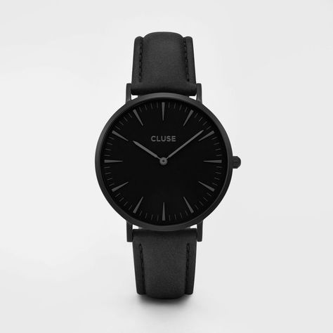 CLUSE La Bohème Full Black  This La Bohème model features an ultrathin case with a 38 mm diameter, crafted with precision for a sophisticated and elegant result. Matte black is combined with a black leather strap, detailed with a matte black clasp. The strap can be easily interchanged, allowing you to personalise your watch. Boho Watch, Slim Watches, Bohemian Style Jewelry, Black Leather Watch, Bohemian Jewellery, Boho Chic Jewelry, Leather Strap Watch, Boho Style Jewelry, Chic Leather