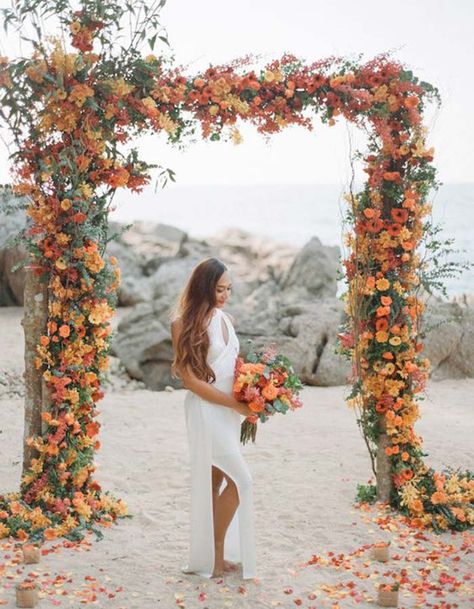 Transition seamlessly into the new season by placing this Fall-inspired arbor at your beach wedding! Beach Wedding Aisles, Beach Wedding Arch, Fall Wedding Arches, Orange Wedding Colors, Beach Wedding Decorations Reception, Tropical Wedding Inspiration, Wedding Orange, How To Dress For A Wedding, Fall Beach