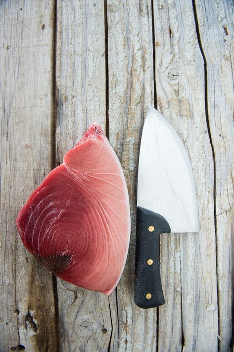 slice of tuna and a fish knife Tuna Fish, Fish Knife, Wood Surface, Fish And Seafood, Vintage Wood, Seafood, Royalty Free Stock Photos, Fish, Wood