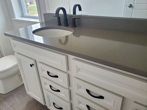 White Vanity Grey Countertop, Black Bathroom Fixtures Gray Cabinets, Gray Quartz Bathroom Countertops, Gray Marble Bathroom Countertop, Dark Gray Bathroom Countertop, Grey Expo Quartz Countertops, Bathroom Grey Countertop, Gray Countertops Bathroom, Grey Quartz Countertops White Cabinets