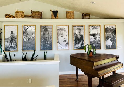 20 foot wall filled with 22x44 smallwood photos in black and white. Photos In Black And White, Framed Signs, Hanging Canvas, Something Unique, Custom Home, Own Home, Home Living Room, Custom Homes, Print Shop