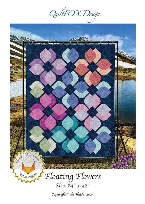 All Patterns Are Brand New From The Designer or Manufacturer! Floating Flowers Stonehenge Quilt Quilting Pattern, From QuiltFox Designs BRAND NEW, Please See Description and Pictures For More Information!  The quilt features the Stonehenge Gradations from Northcott. Stunning, contemporary look with vivid colors and negative space to quilt. I recommend this pattern for quilters with curved piecing experience. Printed Paper Pattern Finished Size: 74in x 92in Final Product: Quilt Paper Templates Included Technique Used: Standard Machine Sewing Skill Level: Intermediate Finished Size: 74" inch x 92" inch. See Pictures For More Information Printed Paper Pattern, Floral Quilts, Flower Quilt Patterns, Curved Piecing, Drunkards Path Quilt, Wall Flowers, Quilting Blocks, Purple Quilts, Wedding Quilt