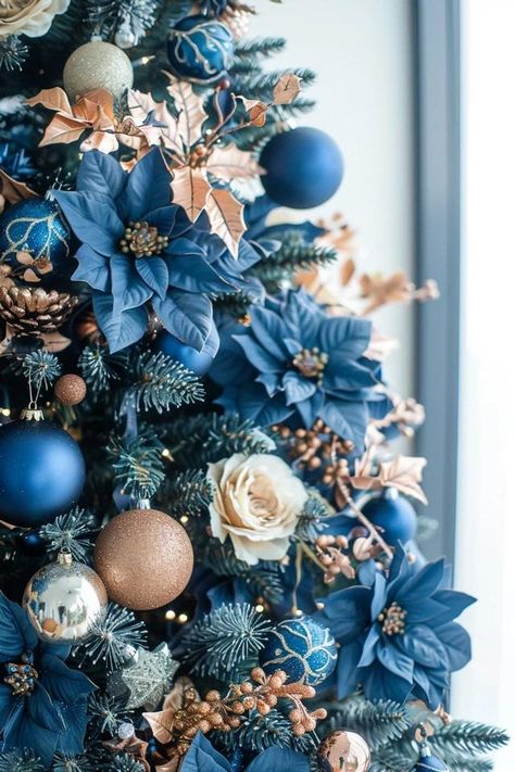 Blue Christmas Tree Ideas for a Unique Holiday Red Blue Christmas Decor, Christmas Tree Blue Theme, Slate Blue Christmas Tree, Dark Blue And Red Christmas Tree, Different Color Christmas Trees, Winter Tree Ideas, Blue Decoration Christmas Tree, Blue Teal Christmas Tree, Blue Christmas Decor Living Room