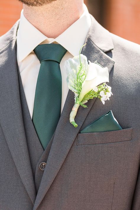 Emerald Green Groomswear and Boutonniere Grey And Emerald Green Suit, Groomsmen In Emerald Green, Suits With Emerald Green, Tux To Match Emerald Green Prom Dress, Green Prom Tuxedo Ideas, Suits To Go With Green Dress, Eucalyptus Wedding Tuxedo, Emerald Green Groom Attire, Grey Suit Wedding Emerald Green