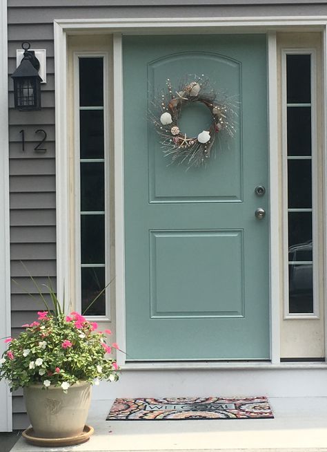 Wythe Blue by Benjamin Moore  This is my front door and it looks so much more soothing and beach. I went from dark gray to this. Two coats of primer helped bring out the true color.  I adore it!! Front Door On Dark Grey House, Door Colors Brown House, Front Doors On Dark Gray Houses, Sea Foam Green Front Door, Front Door Paint Ideas For Gray House, Doors On Grey Houses, Pop Of Color Front Door Gray House, Gray House Blue Front Door, Grey House Door Color Ideas Exterior