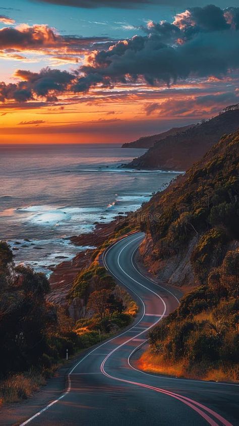 A winding road leading to the ocean at sunset royalty free stock photography Beautiful Roads Photography, Road View From Car, Cars In Sunset, Inktober Inspiration, Great Ocean Road Photography, Ocean At Sunset, Sunset View From Car, Sunset Road, Sun Photography