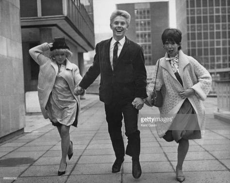 Sixties | L-R French actress Sophie Hardy, English singer Joe Brown and English actress Una Stubbs during filming of One Day in London, later titled Three Hats for Lisa, on the Podium in London, 12th October 1964 Movie One Day, One Day In London, Una Stubbs, Day In London, Joe Brown, French Actress, English Actresses, English News, The Movie