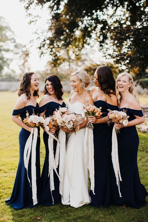 Smiling bride and bridesmaids at Elmore cost wedding in navy blue bridesmaid dresses Navy Blue And Rose Gold Wedding Bridesmaid Dresses Bridal Parties, Deep Navy Bridesmaid Dresses, Storm Blue Wedding, Nautical Bridesmaid Dress, Dark Blue Bridesmaids, Navy Blue Wedding Ideas, Navy Bridesmaids Dresses, Long Navy Blue Bridesmaid Dresses, Midnight Blue Bridesmaid Dresses