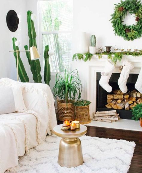 This Is How to Nail Desert Chic Christmas Decor | Hunker Desert Inspired Decor, Desert Christmas, California Christmas, Chic Christmas Decor, Boho Christmas Decor, Desert Chic, Desert Decor, Rope Decor, Rustic Planters