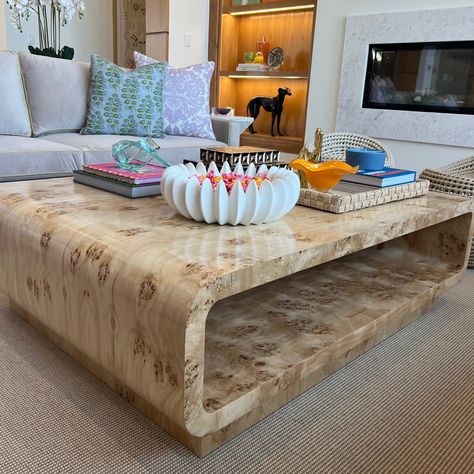 Finish shown: Burl Wood - Olive Ash Golden Oak, Mappa Natural The Elisabeth Coffee Table is named after Aryn’s favorite baking and foodie blogger Elisabeth from 'Elisabeth & Butter'. Have you tried her salted peanut butter and chocolate chip cookies? The Elisabeth Coffee Table is not only sleek and stylish, but it's also kid-friendly with its soft curved edges. We love this coffee table because it allows you to style coffee table books or a large tray on the bottom shelf. Ottomans Under Coffee Table, Coffee Table Between Two Sofas, Trunk Coffee Table Living Room, Big Square Coffee Table Decor, Large Coffee Table Books, Large Coffee Table Styling, Coffee Table Book Styling, Condo Aesthetic, Burl Wood Coffee Table Living Rooms